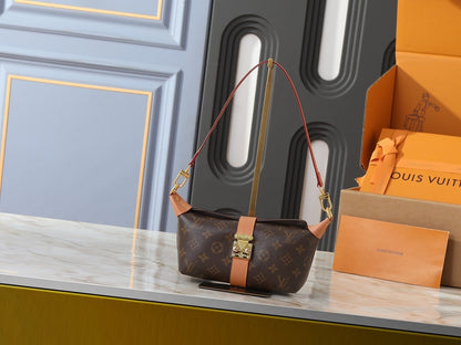 Pochette Mia Monogram Handbag