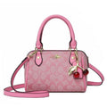 Mini Rowan Crossbody Bag In Signature Canvas