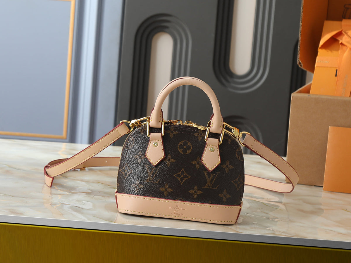Alma BB Monogram Canva Brown Handbag