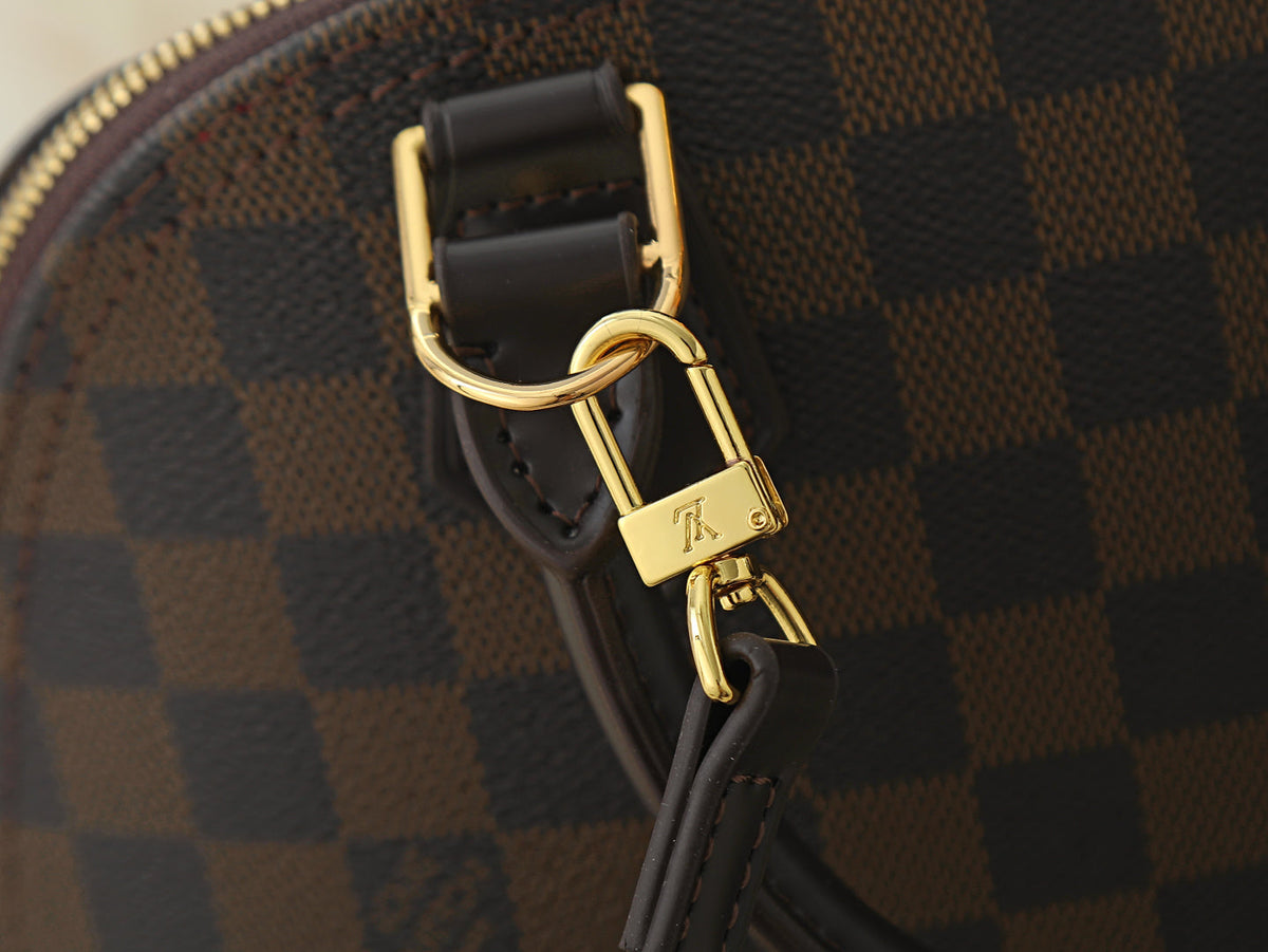 Alma Ebene Canvas Handbag